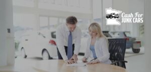 where to sign title when junking a car